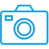 Tvådimensionell, ljusblå illustration av en kamera